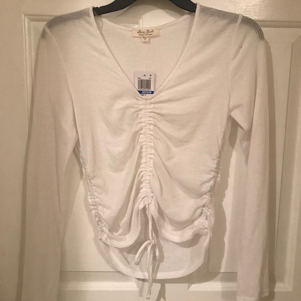 white long sleeve top